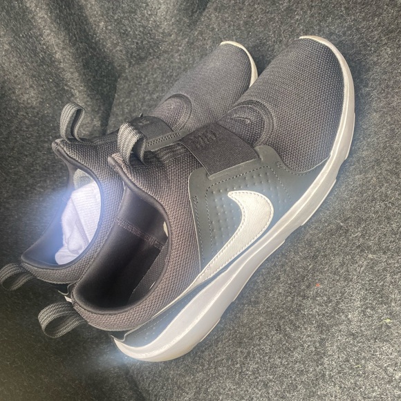 Nike. Size 10. Used as new.  Bought it brand new at Nike store and seems tight. - Picture 2 of 2